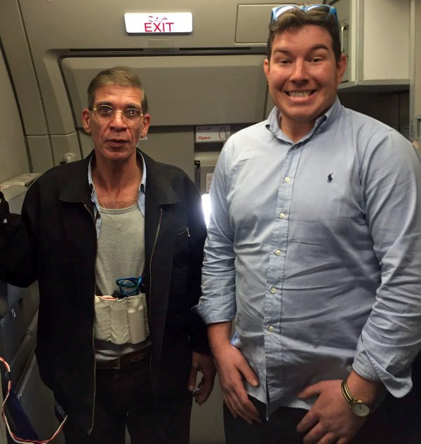 "Lovejacker" Seif Eldin Mustafa poses for a surreal snap with one of the passengers.
